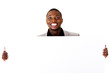 Photo: Happy successful businessman holding blank advertisement. Happy successful businessman holding blank advertisement.