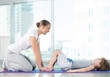 Photo: Healthy morning stretching - woman with son doing gymnastic exer Healthy morning stretching - woman with son doing gymnastic exer