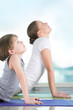 Mother and son doing exercise at home