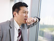 Photo: thinking asian businessman thinking asian businessman