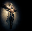 Crucifix in church on the stone wall.