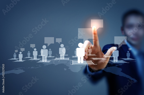 Photo: Image of male touching icon of social network Image of male touching icon of social network