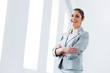 Photo: Attractive asian businesswoman in grey suit Attractive asian businesswoman in grey suit