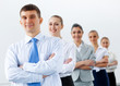 Group of business people standing in row