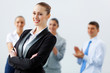 Four businesswomen standing in row