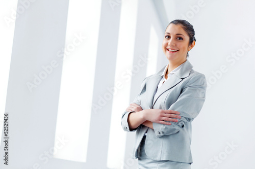 Photo: Attractive asian businesswoman in grey suit Attractive asian businesswoman in grey suit