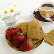Coffee, cookies and strawberries