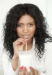 Woman drinking a glass of milk