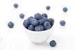 Fresh blueberries in a white bowl