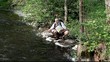 Hiker in the woods by the river/episode1/