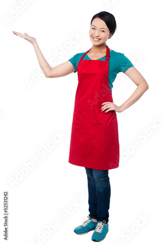 Photo: Female chef promoting bakery product Female chef promoting bakery product