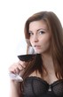 Photo: beautiful young woman enjoying wine (white background) beautiful young woman enjoying wine (white background)