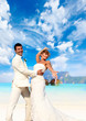 Young couple at their beach wedding