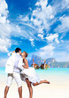 Young couple at their beach wedding