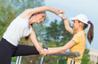 Stretching sports girl friends  warming up