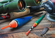 fishing tackle on a wooden table