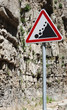 Falling rocks sign on a road