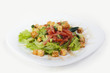 Vegetable salad with croutons and red pepper