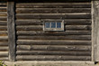 Village house wall with small window