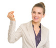 Smiling business woman snapping fingers