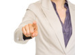 Closeup on business woman pointing in camera