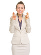 Happy business woman with crossed fingers