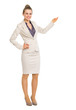 Full length portrait of business woman pointing on copy space