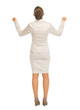 Photo: Full length portrait of happy rejoicing success. rear view Full length portrait of happy rejoicing success. rear view