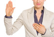 Closeup on business woman oath truth