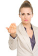 Serious business woman calling with hand gesture