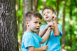 Brothers with branch