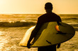 Surfer watching the waves