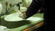 Woman washing the dinner dishes