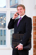 Laywer or Businessperson in Office on the phone