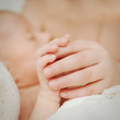 Foto: Two small children's hands Two small children's hands
