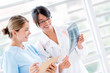 Doctor talking to a nurse