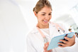 Doctor using a tablet computer