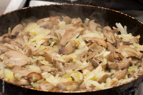 Photo: background of mushrooms fried in a pan background of mushrooms fried in a pan