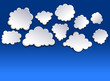 White clouds on blue sky. Paper-cut effect