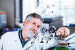 Senior male researcher carrying out scientific research in a lab