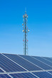 solar panel against high voltage towers