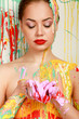 Photo: Beautiful woman painted with many vivid colors. Beautiful woman painted with many vivid colors.