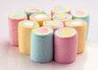 group of colored marshmallows on white background