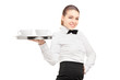 Photo: A waitress with bow tie holding a tray with coffee cups on it A waitress with bow tie holding a tray with coffee cups on it