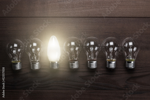 Photo: glowing bulb uniqueness concept glowing bulb uniqueness concept