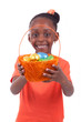African girl holding chocolate ester egg