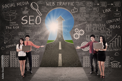 Photo: Business team present SEO success road concept Business team present SEO success road concept