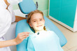 Little girl visiting dentist