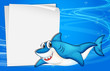 An empty paper under the sea beside a shark