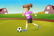 A girl playing football at the farm